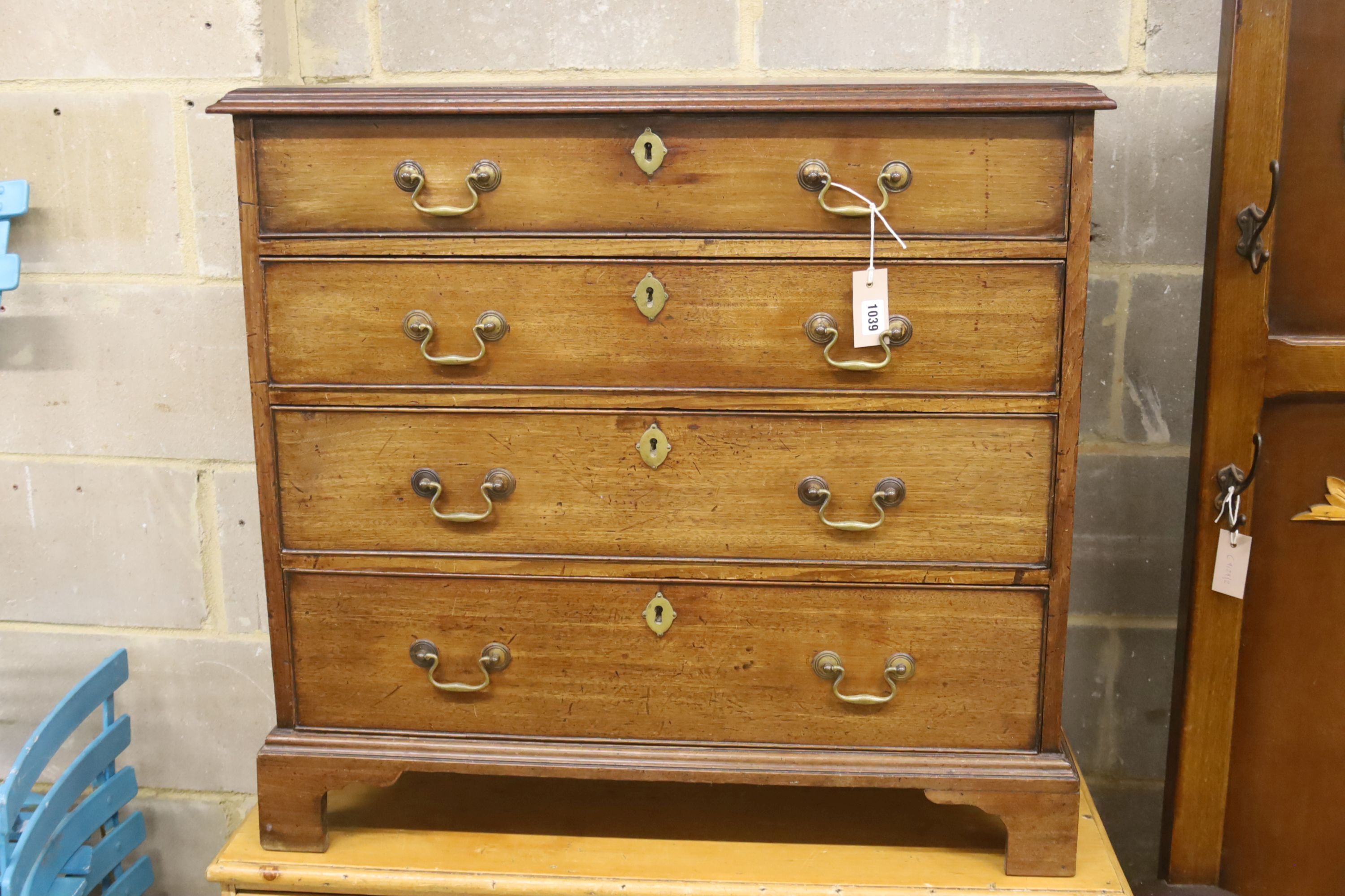 A small George III mahogany chest of four long drawers, width 82cm, depth 47cm, height 78cm